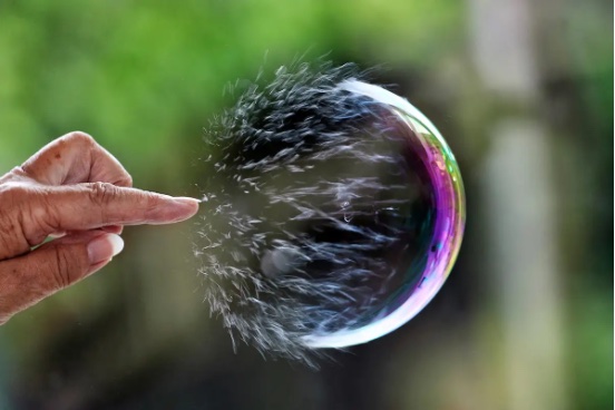 A bursting soap bubble
